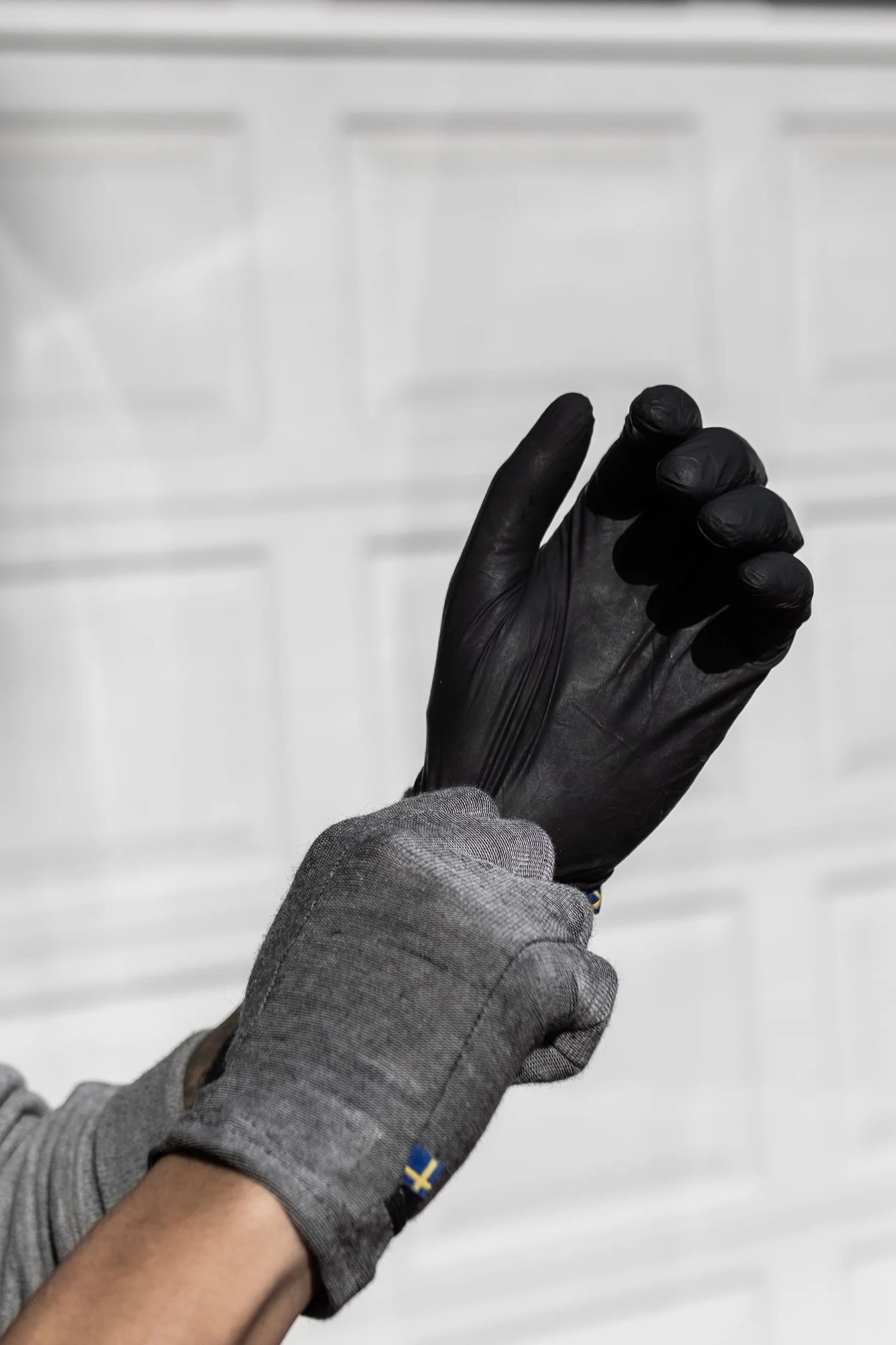 Nitrile glove pulled over DRYE liner