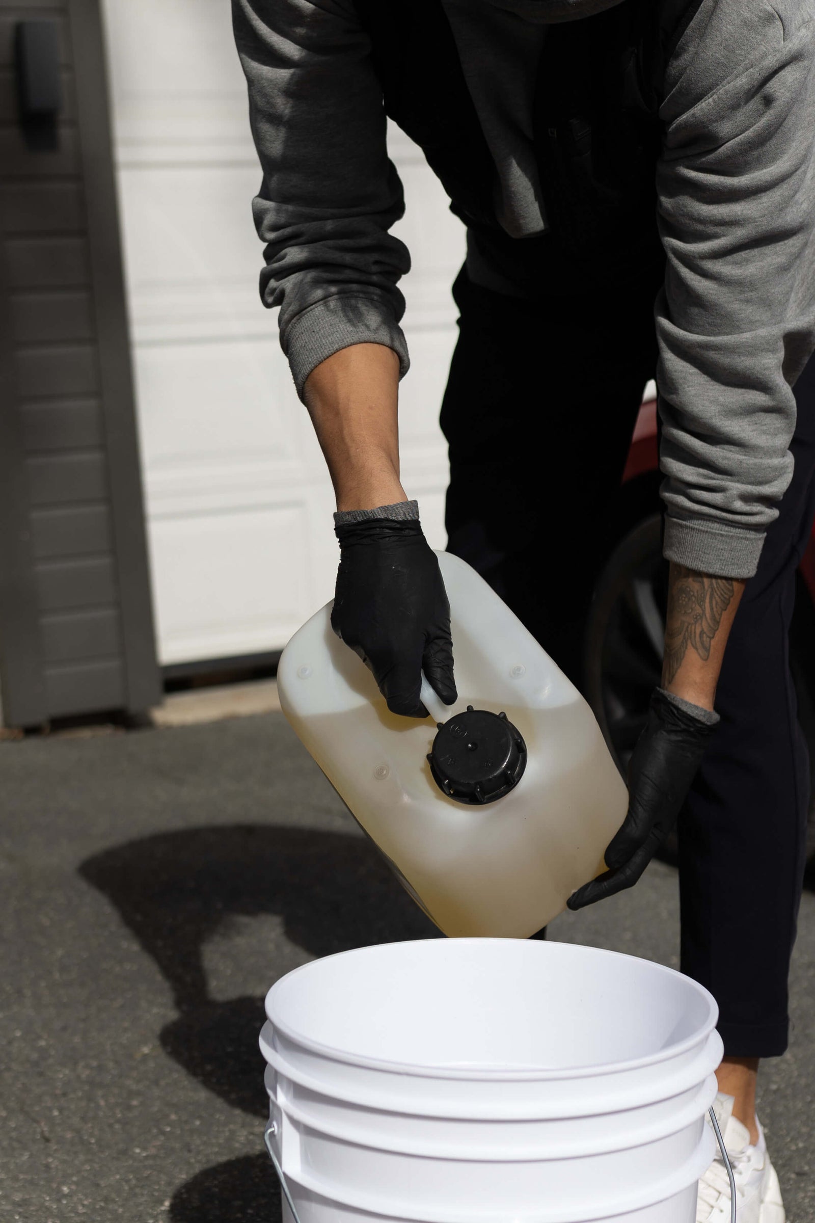 DRYE liner being put on under a nitrile glove