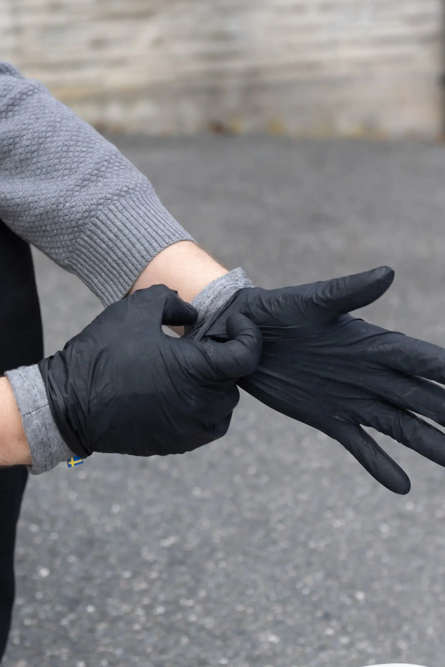 DRYE liner worn on hand before nitrile glove
