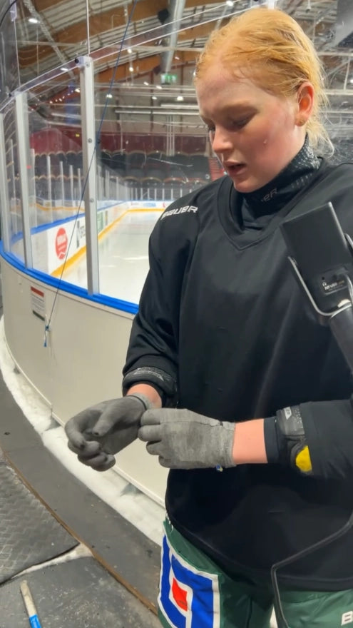 Worker wearing DRYE glove liners