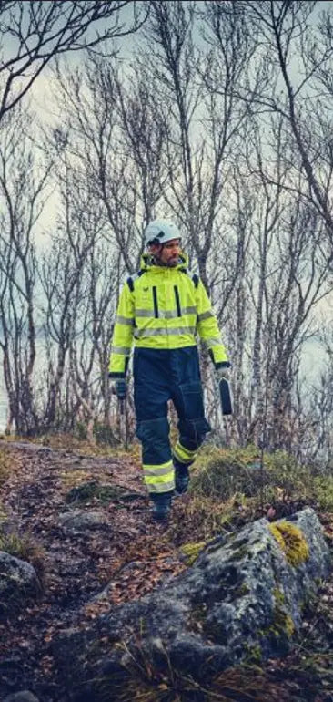 Worker wearing DRYE glove liners